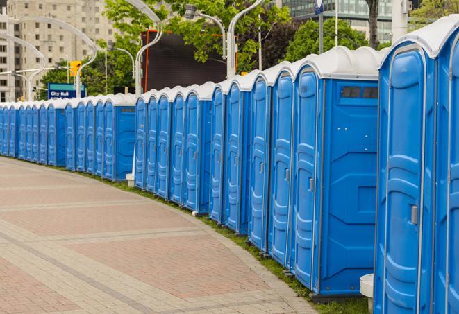 a line of brightly-colored portable restrooms, perfect for outdoor festivals and concerts in Cutler Bay